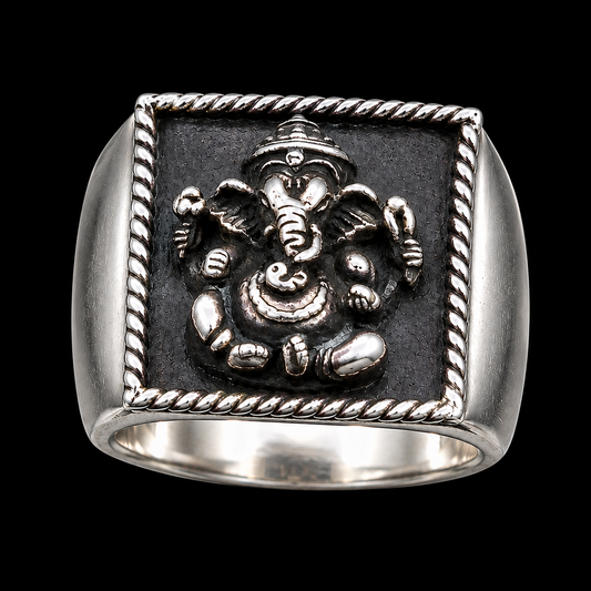 A square silver-tone ring with a Ganesha motif and CZ stone detail.
