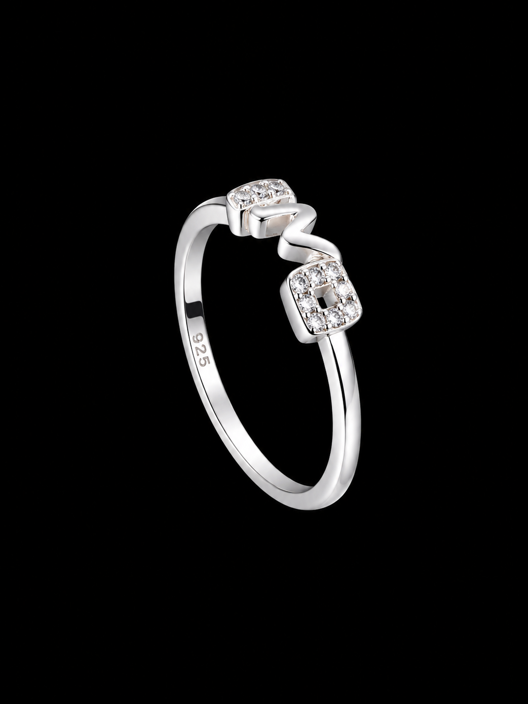 A silver ring with a central CZ stone and a delicate design.