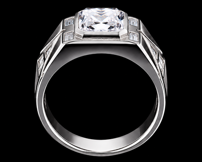 A silver-tone ring with a large cubic zirconia stone and smaller stones on either side.