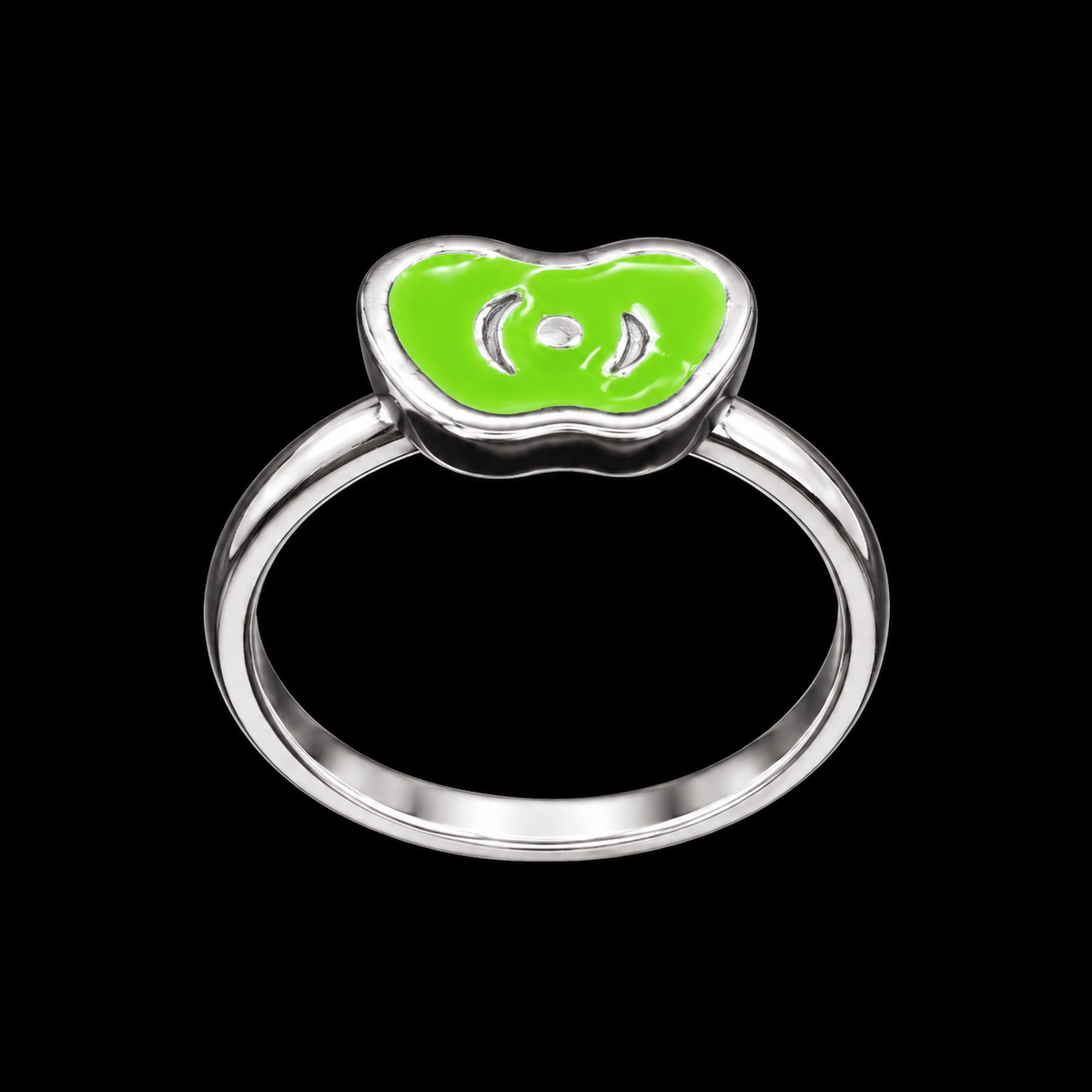 A silver-tone ring with a green enamel design.