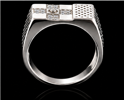 A silver ring with a row of clear cubic zirconia stones on the top band.