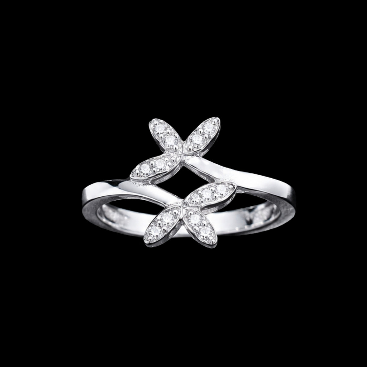 A silver ring with a butterfly design and clear CZ stones.