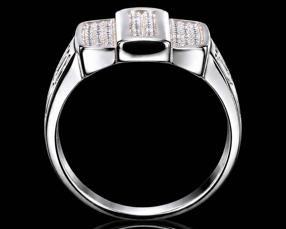 A silver ring with a rectangular design and three rows of clear cubic zirconia stones.