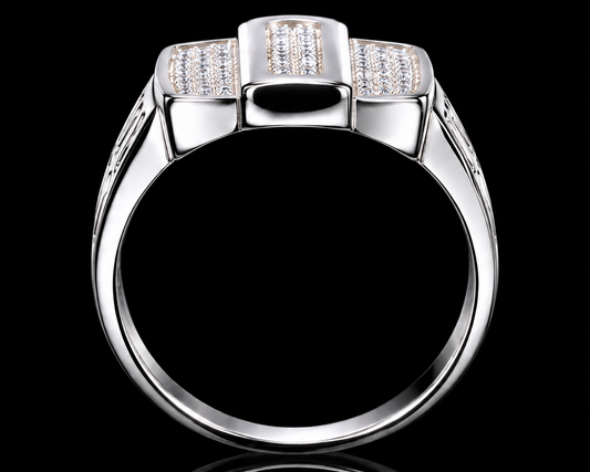 A silver ring with a rectangular design and three rows of clear cubic zirconia stones.