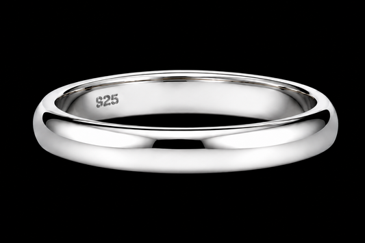 A silver ring with a smooth, rounded band.