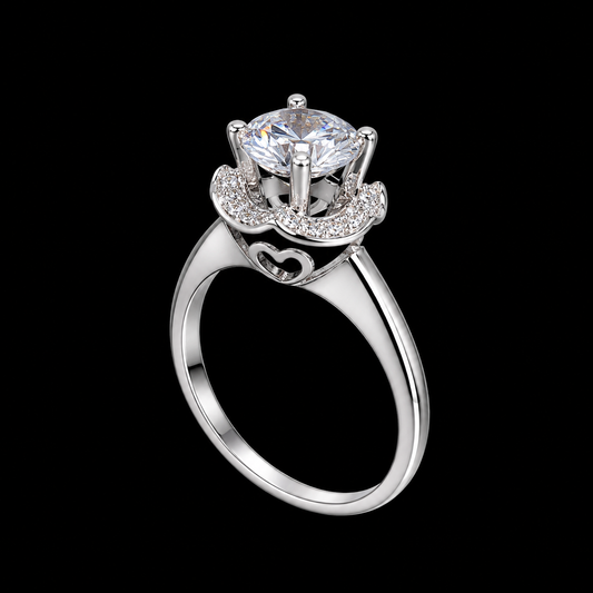 A silver ring with a large CZ stone and heart design