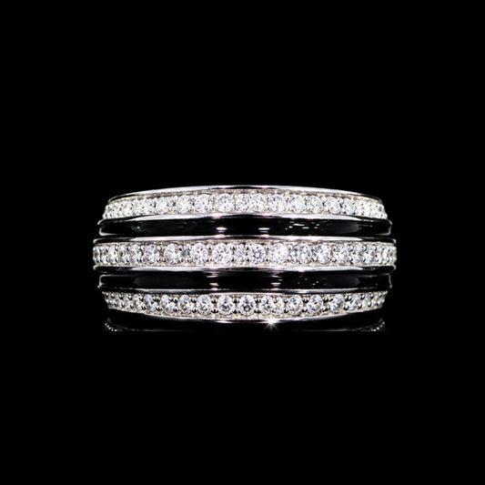 A silver ring with a row of clear cubic zirconia stones.