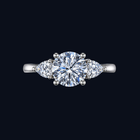 Silver Pear Trio CZ Ring